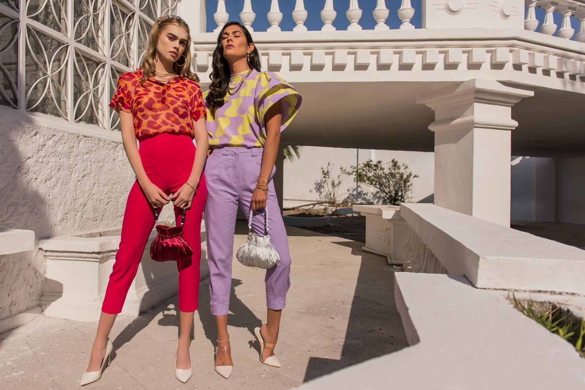 photo of stylish women with bags